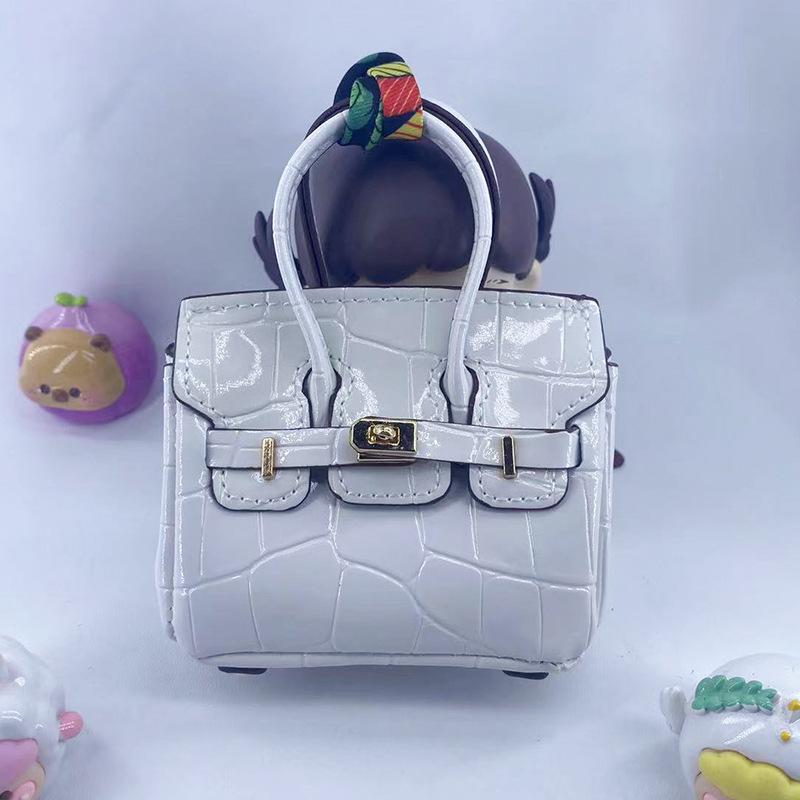 Borsa B-Buzz 23 In Pelle Con Lavorazione Effetto Coccodrillo In Rilievo  Donna | Borse Accessori bianco